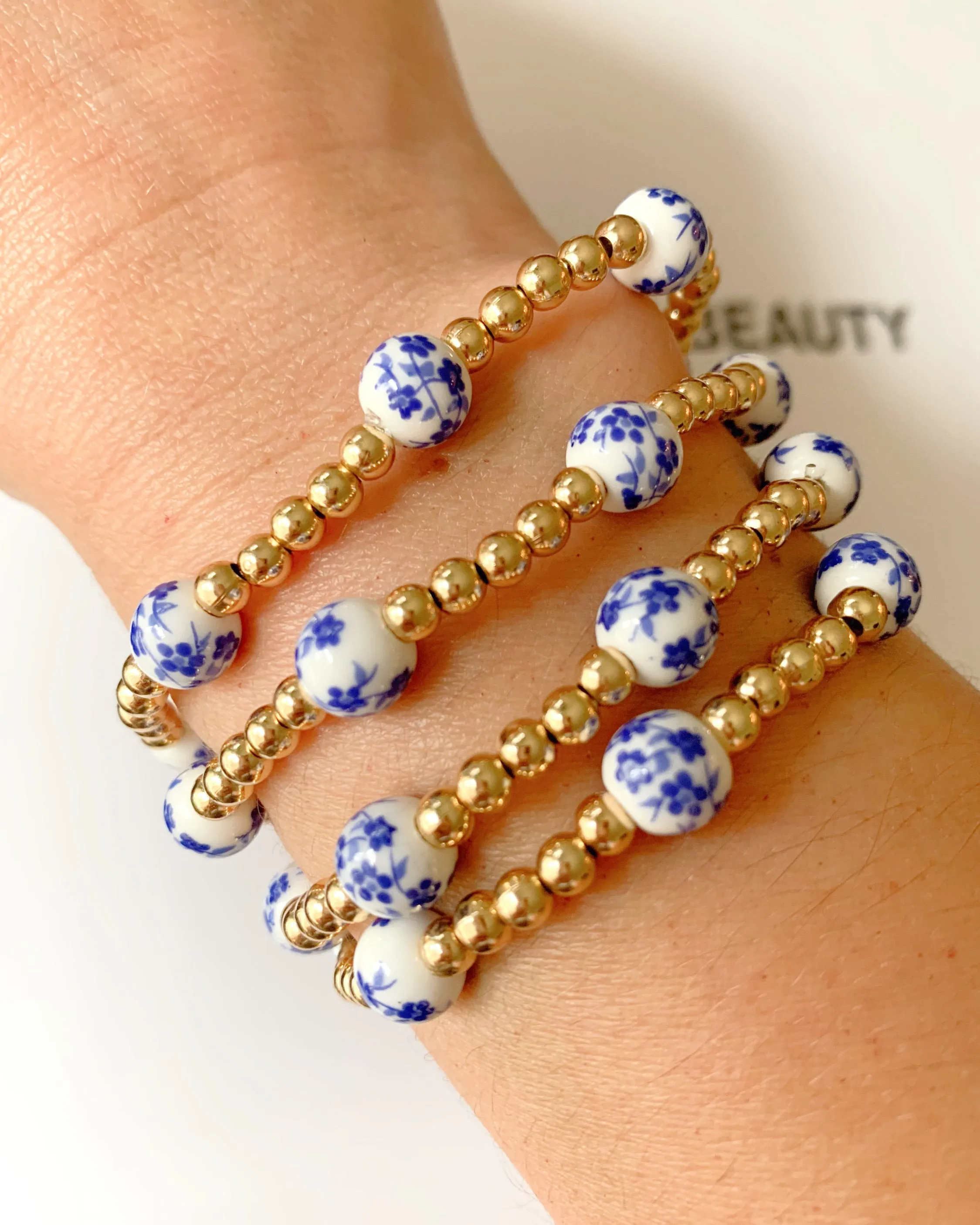 Blue Floral gold beaded bracelet