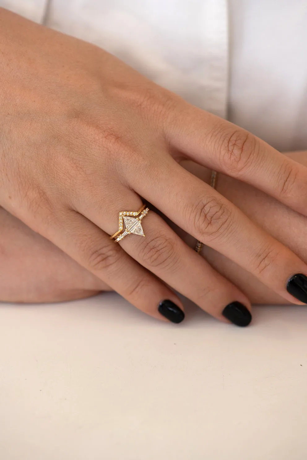 Geometric Engagement Ring with Triangle and Baguette Diamonds